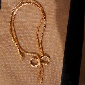 Gold colored tie chain necklace